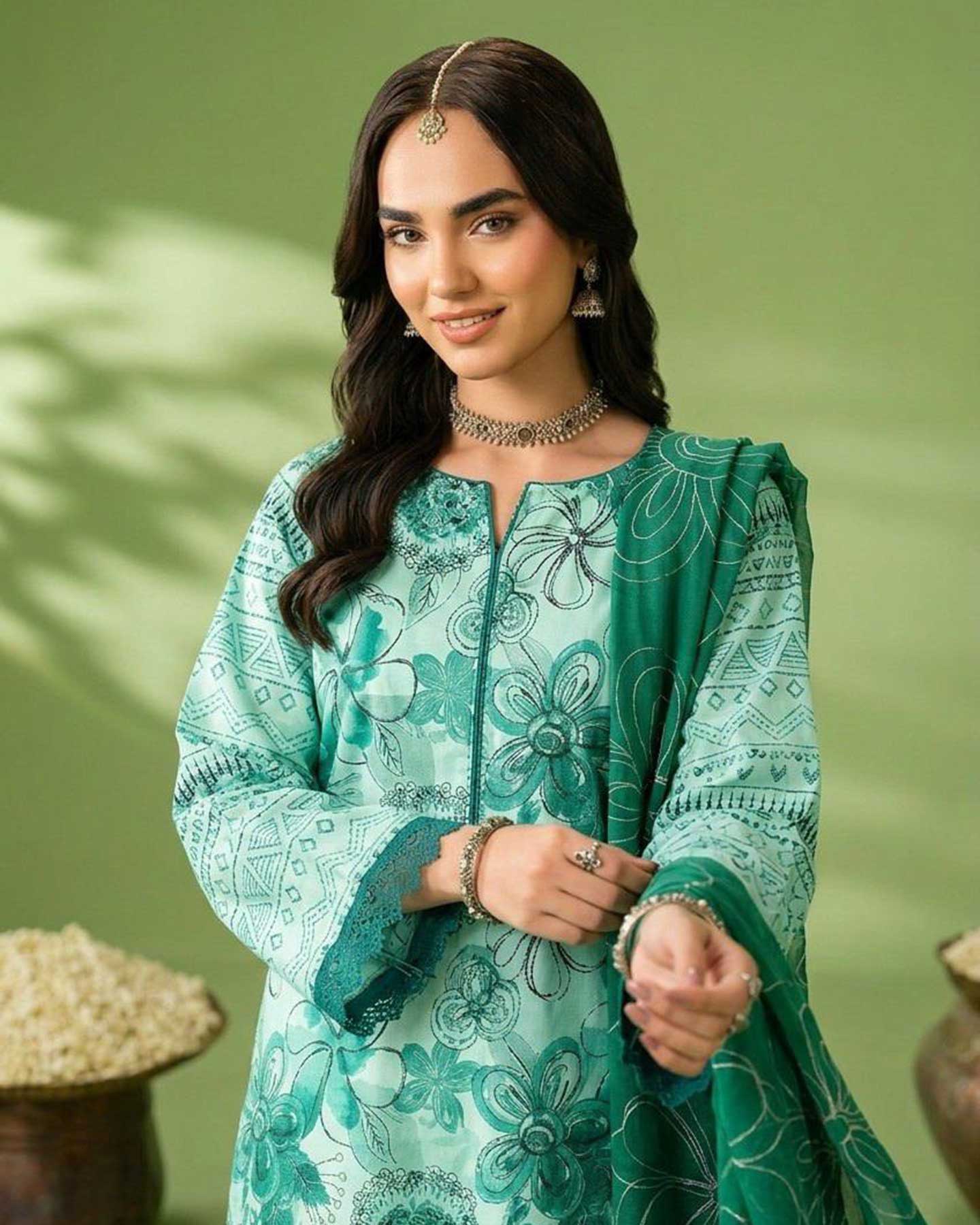 Gulfraz embroidered lawn fabric D 02 with intricate floral embroidery on soft, lightweight material suitable for summer wear