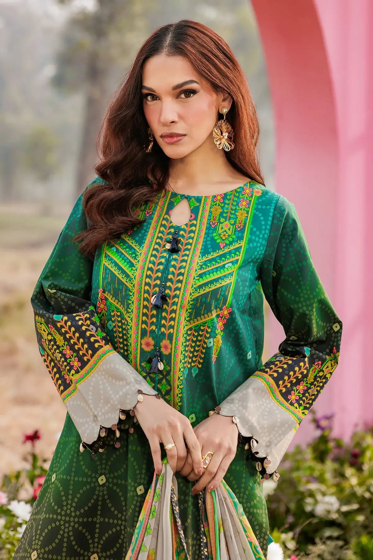 Close-up of Gulfraz CRB6-01 embroidered lawn fabric with intricate floral embroidery and vibrant colors.