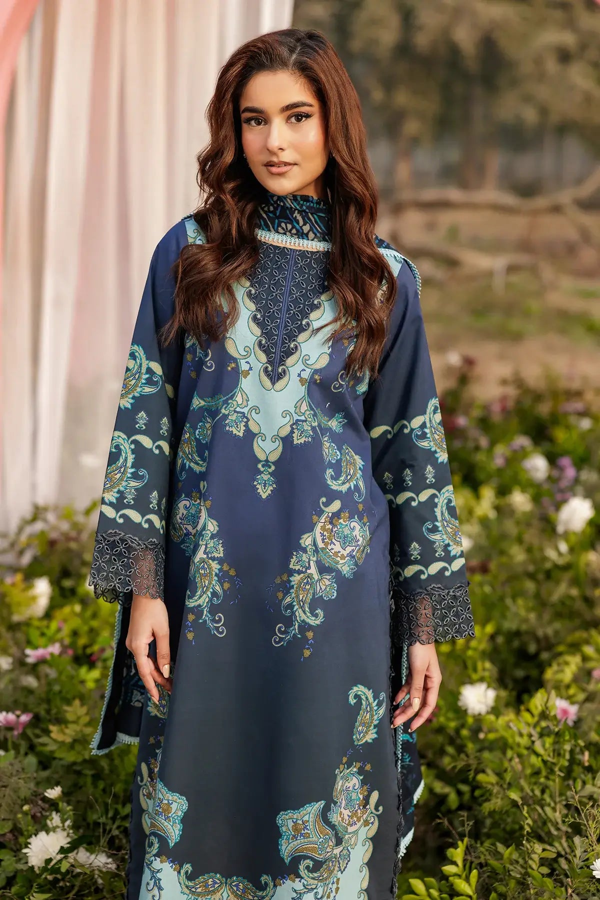 Elegant embroidered Gulfraz lawn fabric CRB6-03 with intricate floral patterns on light-colored material.