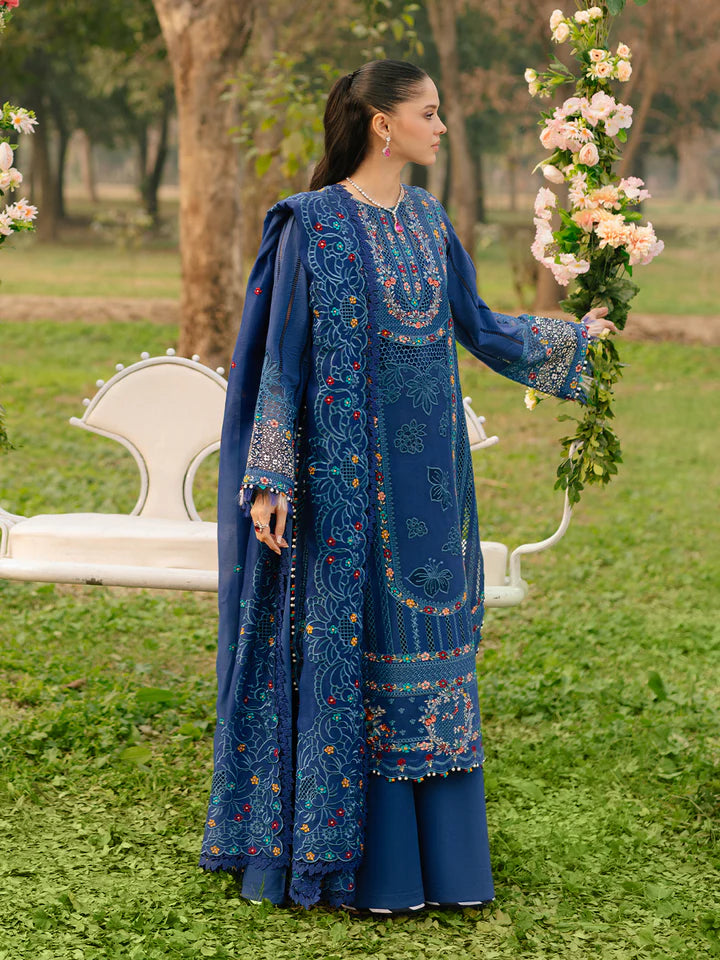 Luxury Gulfraz lawn fabric in shade 102-B, showing a close-up of the soft, vibrant green textile texture.
