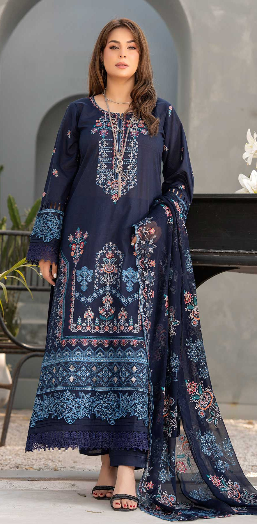 Embroidered Gulfraz lawn fabric in 26 D 01 with intricate floral embroidery, showcasing detailed craftsmanship and vibrant design.