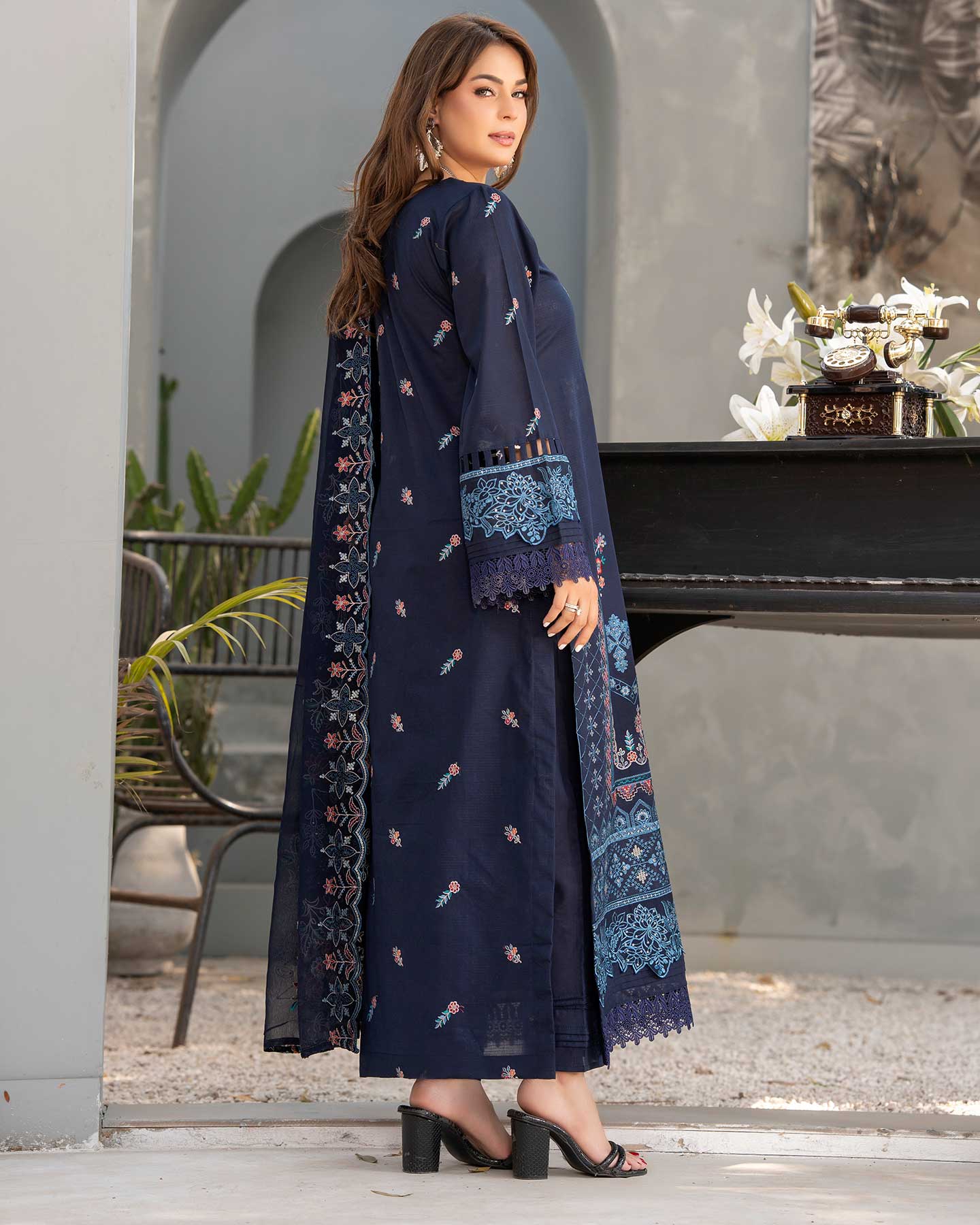 Embroidered Gulfraz lawn fabric in 26 D 01 with intricate floral embroidery on soft, lightweight lawn material.