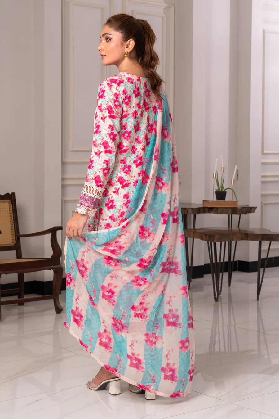 Elegant embroidered Gulfraz lawn fabric in JH-977-RI design, featuring intricate embroidery on soft, high-quality lawn material.