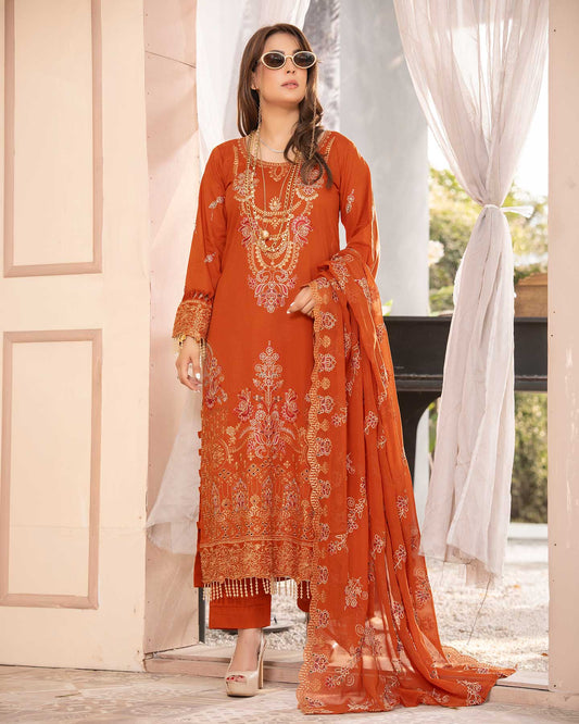 Embroidered Gulfraz lawn fabric D 06 with intricate embroidery in vibrant colors, displayed in a close-up view of the textile.