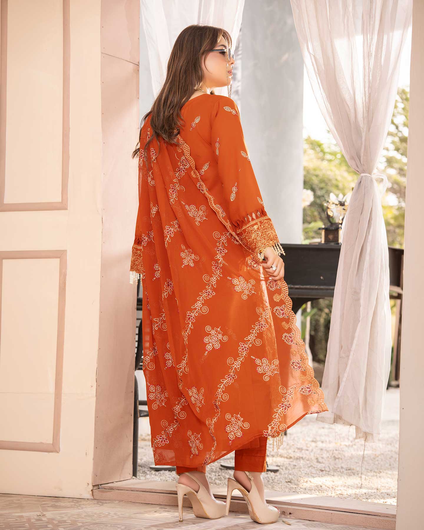 Embroidered Gulfraz D 06 lawn fabric with intricate embroidery in vibrant colors, displayed in the image.