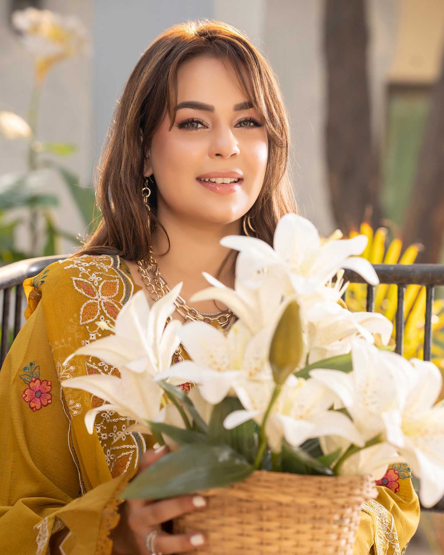 Embroidered Gulfraz lawn fabric D 07 with intricate floral embroidery on soft, lightweight material, ideal for summer clothing.