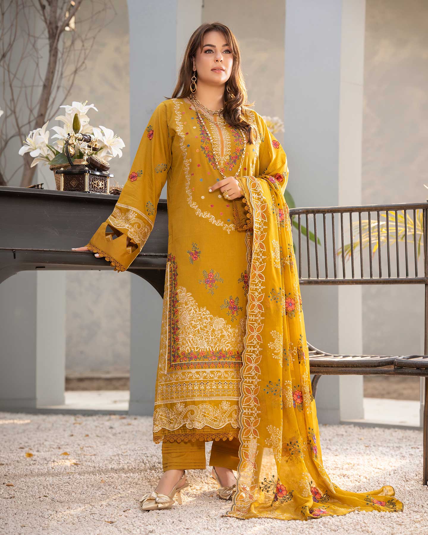 Embossed Gulfraz D 07 embroidered lawn fabric with intricate floral embroidery on light-colored material.
