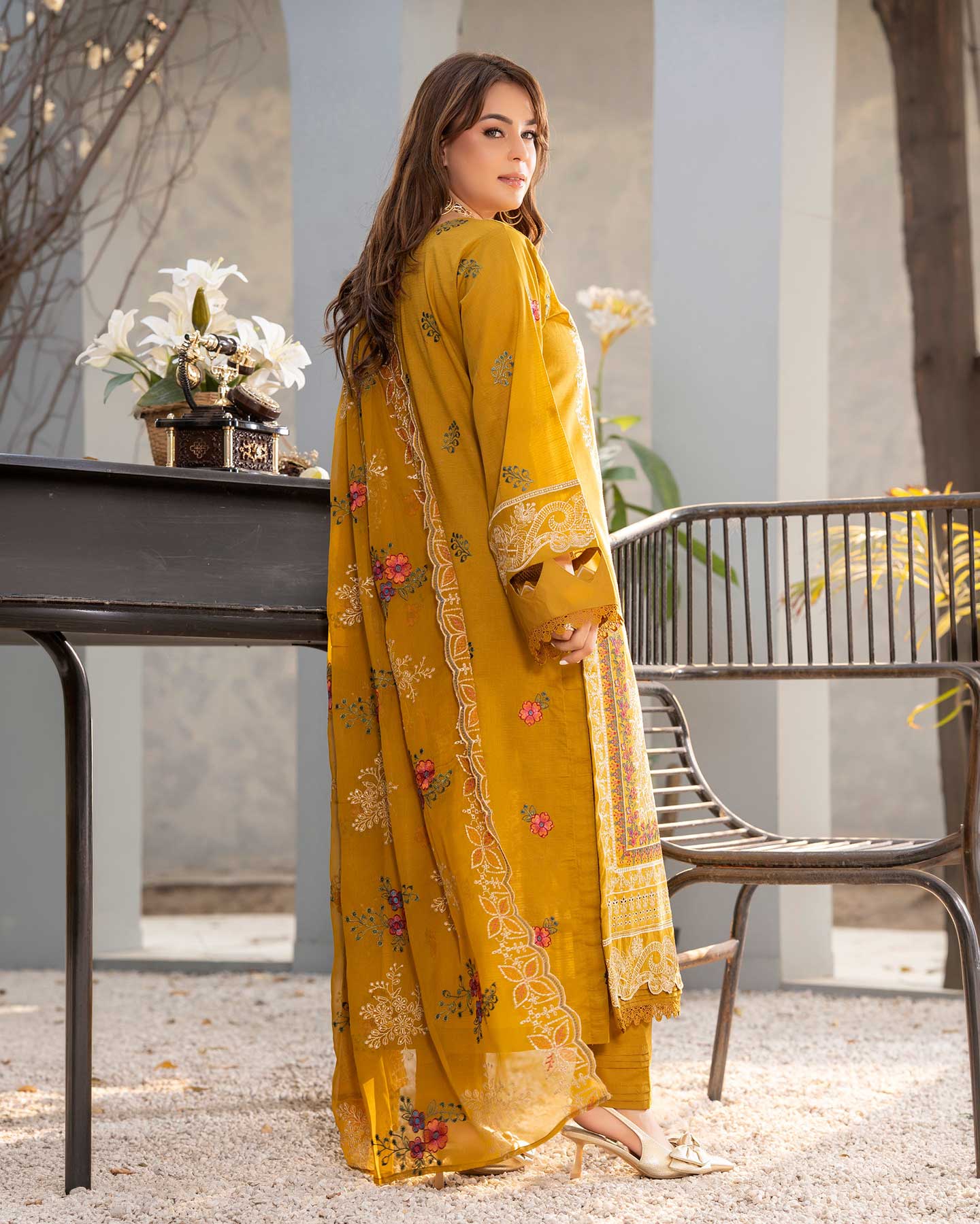 Embroidered Gulfraz lawn D 07 fabric with intricate floral embroidery on soft, light-colored lawn material.