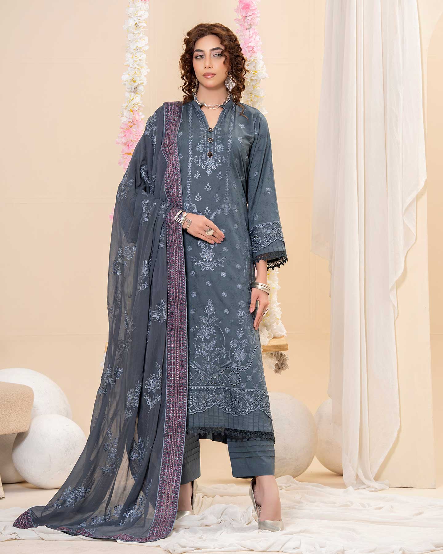 Embroidered Gulfraz D 02 lawn fabric featuring intricate floral embroidery on soft, lightweight fabric for elegant ethnic wear.