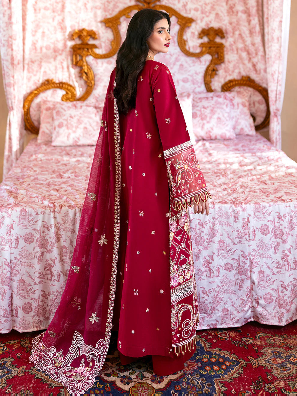 Luxury Gulfraz Ginny lawn fabric in vibrant green, showcasing detailed floral and geometric patterns in high-quality textile.