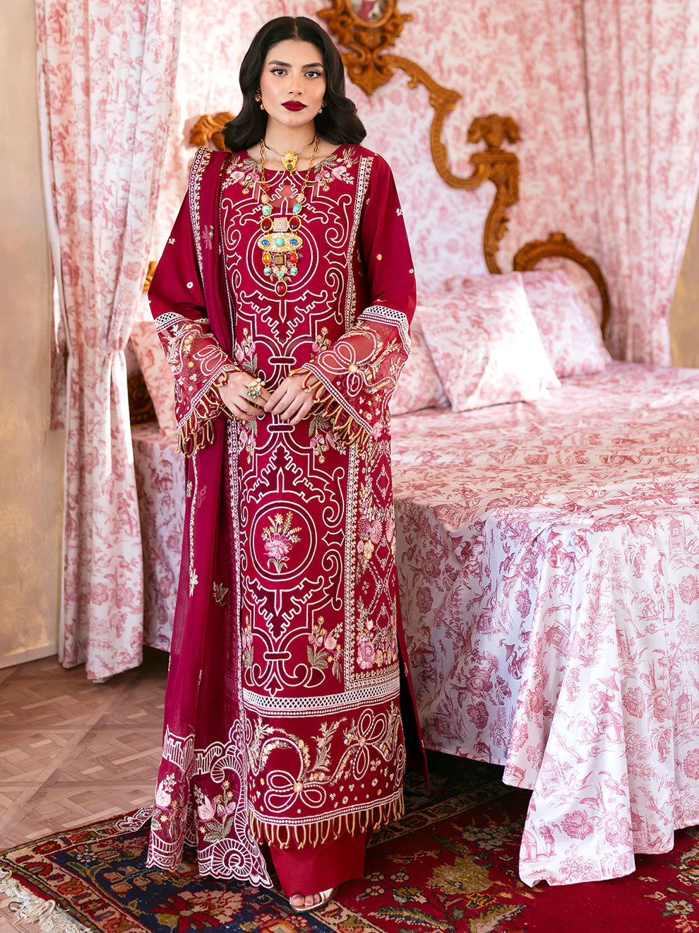 Luxury Gulfraz Ginny lawn fabric in vibrant floral pattern, showcasing colorful textile design suitable for elegant summer wear.